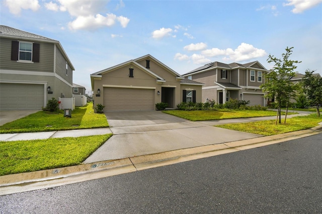 view of front of home featuring stucco siding, driveway, an attached garage, and a front lawn