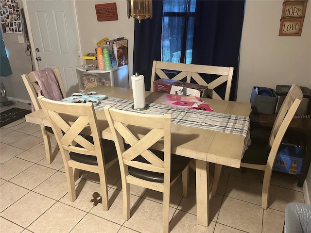 dining room with light tile patterned floors