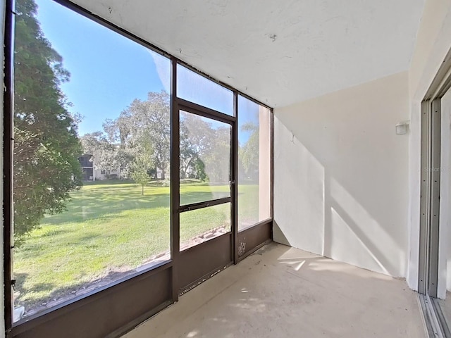 unfurnished sunroom featuring plenty of natural light