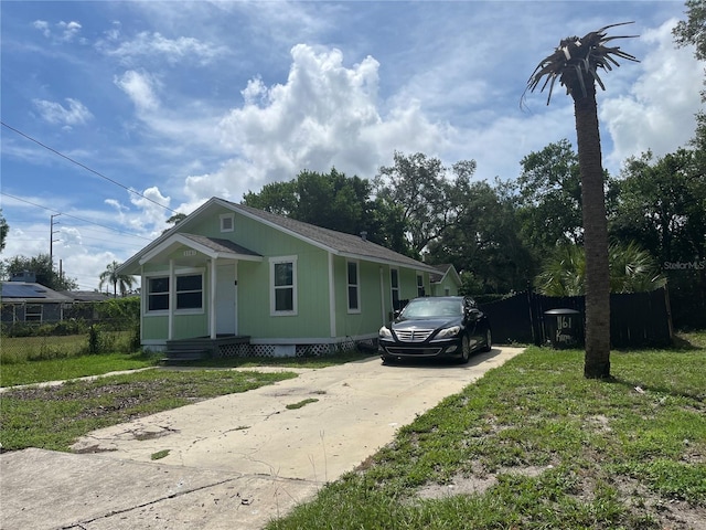 view of front of property with a front lawn