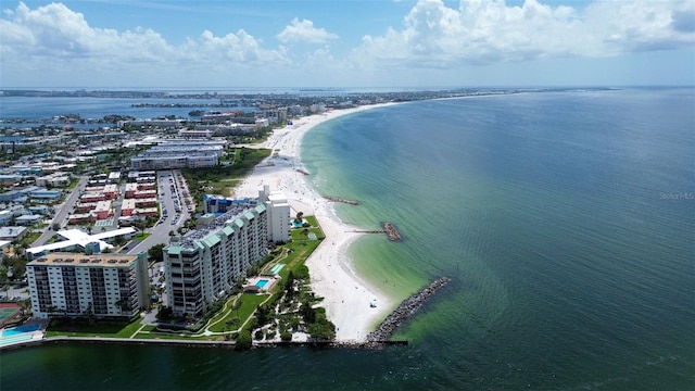 bird's eye view featuring a beach view and a water view