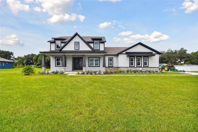 view of front of property with a front lawn