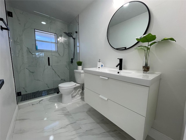 bathroom featuring a shower with shower door, toilet, and vanity