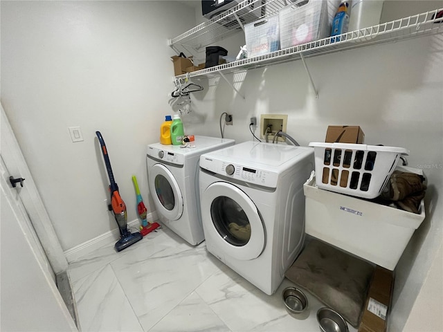 laundry area featuring separate washer and dryer