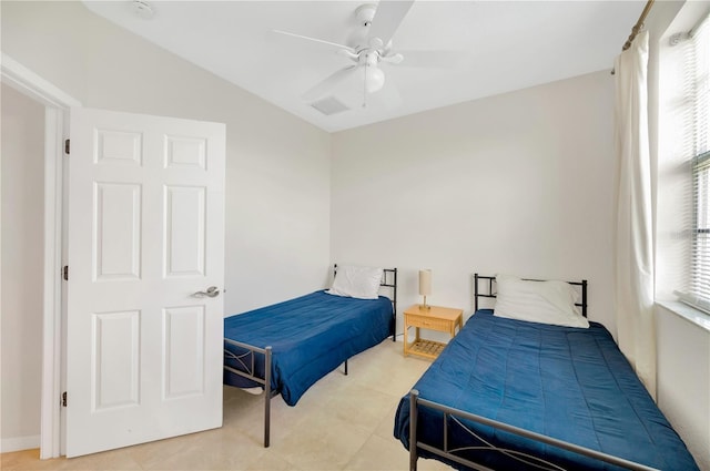 6419 Marbella Blvd, Apollo Beach, FL 33572 - bedroom featuring multiple windows, lofted ceiling, a ceiling fan, and light tile patterned floors