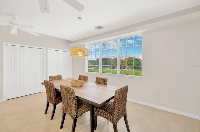 6419 Marbella Blvd, Apollo Beach, FL 33572 - dining area with ceiling fan, baseboards, and light tile patterned floors