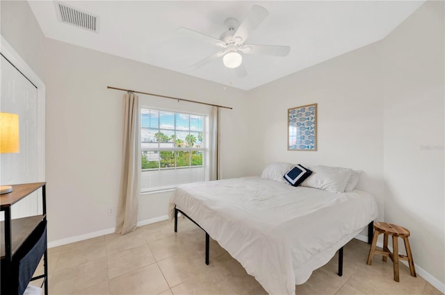 6419 Marbella Blvd, Apollo Beach, FL 33572 - bedroom featuring baseboards, a ceiling fan, and light tile patterned flooring
