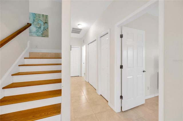 6419 Marbella Blvd, Apollo Beach, FL 33572 - stairs featuring tile patterned floors and baseboards