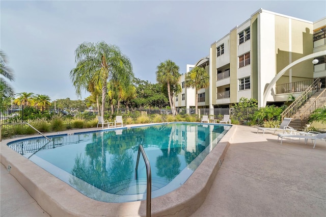 view of pool featuring a patio