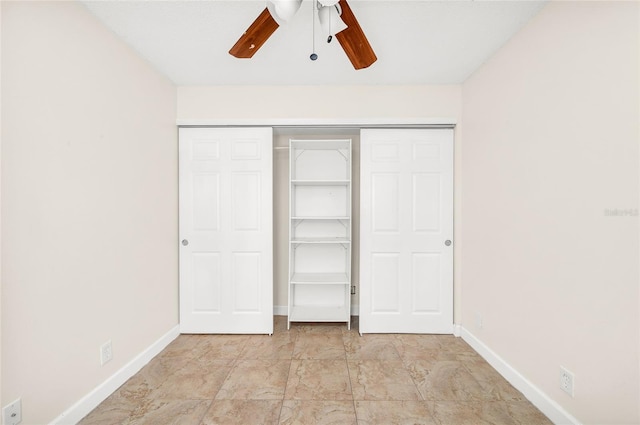 unfurnished bedroom featuring a closet and ceiling fan