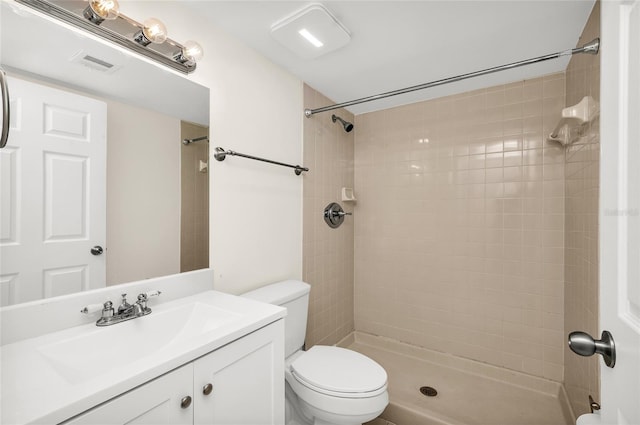 full bath with vanity, toilet, visible vents, and tiled shower