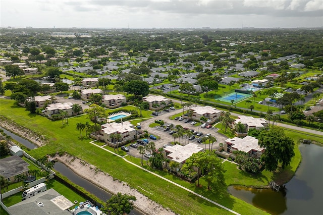 bird's eye view with a water view