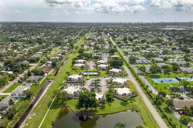 aerial view featuring a residential view and a water view