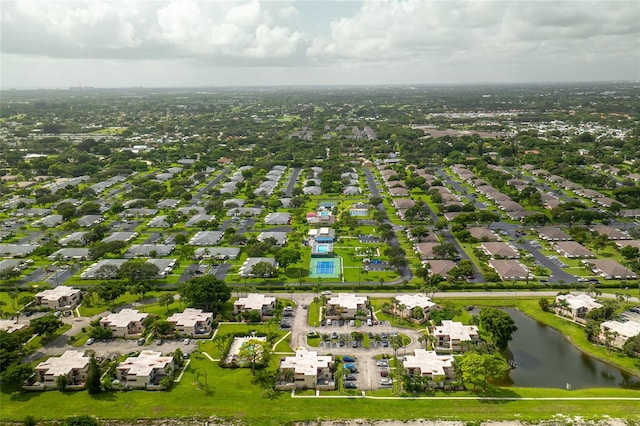 aerial view with a water view and a residential view