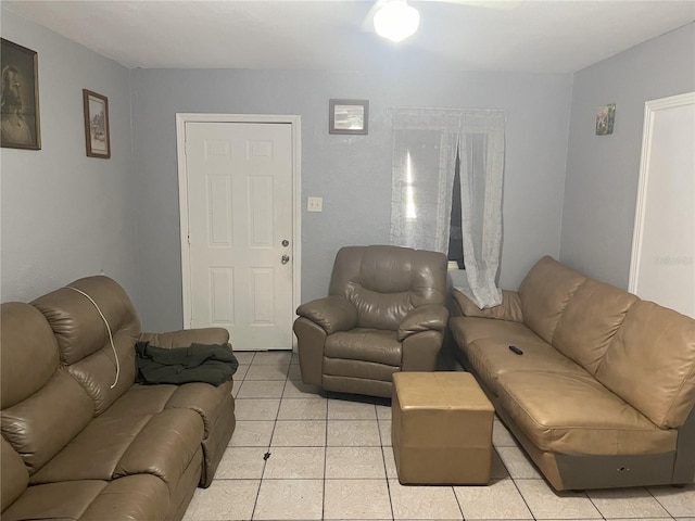 living room with light tile patterned floors