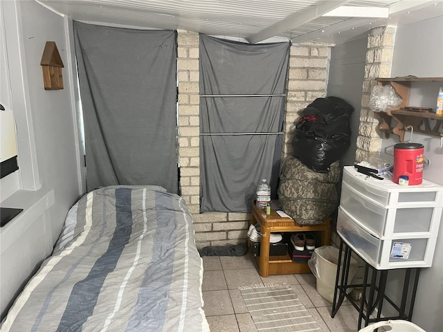 bedroom featuring light tile patterned flooring