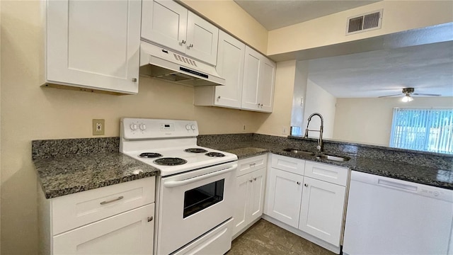 kitchen featuring visible vents, under cabinet range hood, white appliances, white cabinetry, and a sink