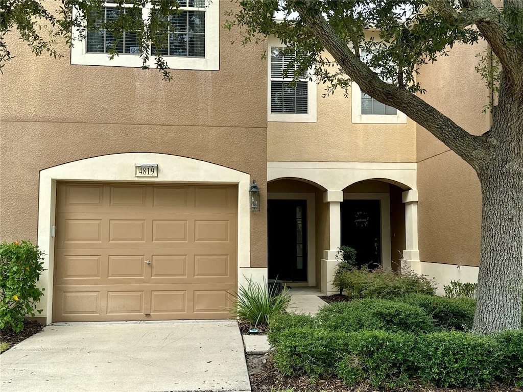 view of front of property featuring a garage