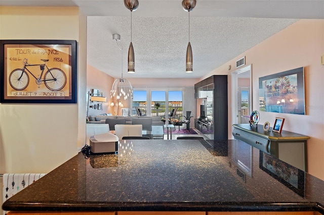 living room with a textured ceiling