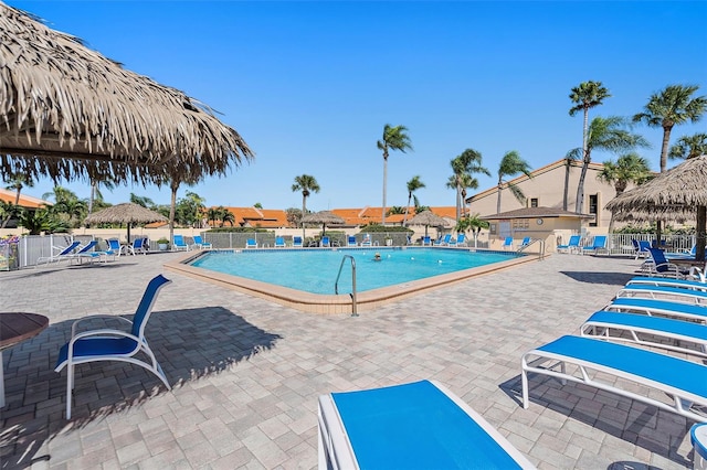 view of swimming pool featuring a patio area