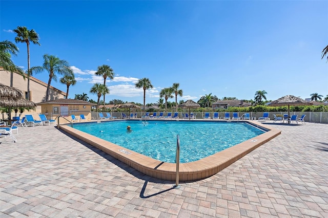 view of swimming pool with a patio area