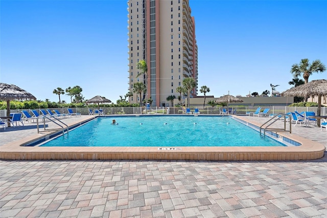 view of swimming pool with a patio area