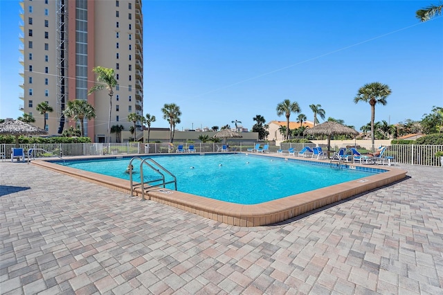 view of swimming pool with a patio area