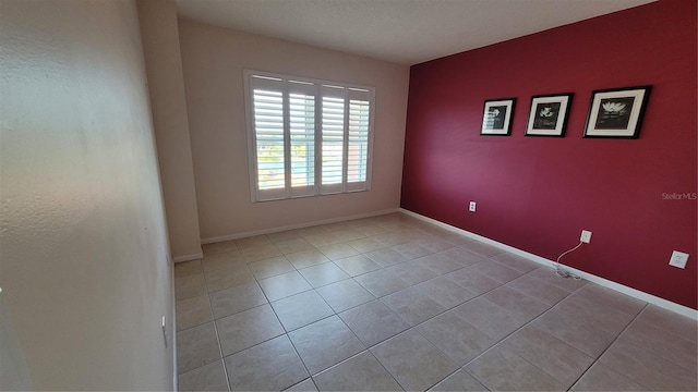 view of tiled spare room