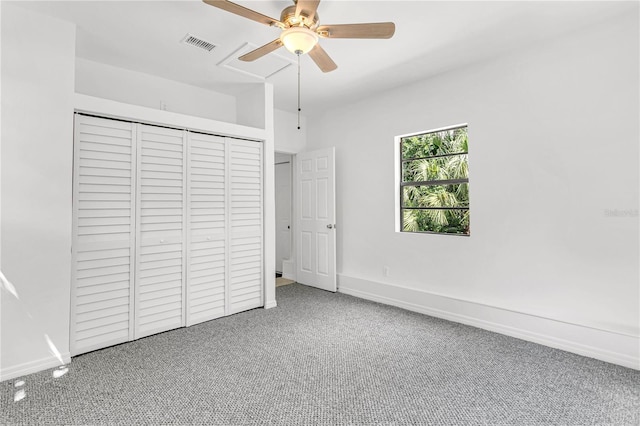 unfurnished bedroom with a closet, ceiling fan, and carpet