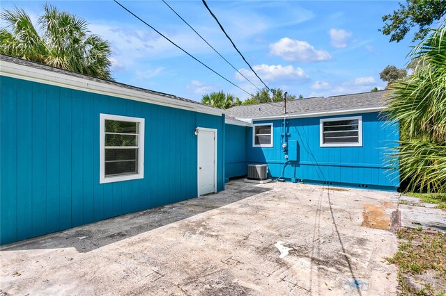 rear view of property featuring a patio area