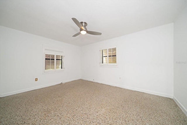 spare room featuring ceiling fan