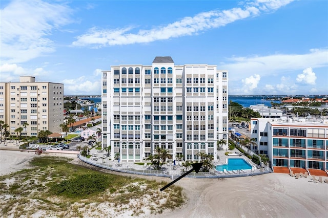 view of building exterior featuring a water view