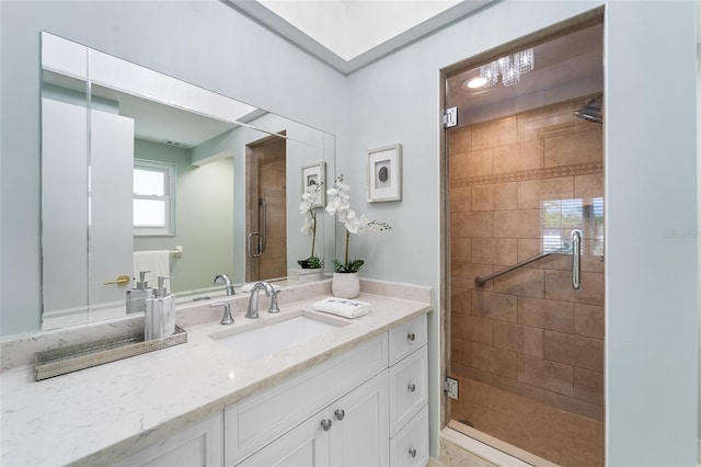 bathroom featuring vanity and walk in shower