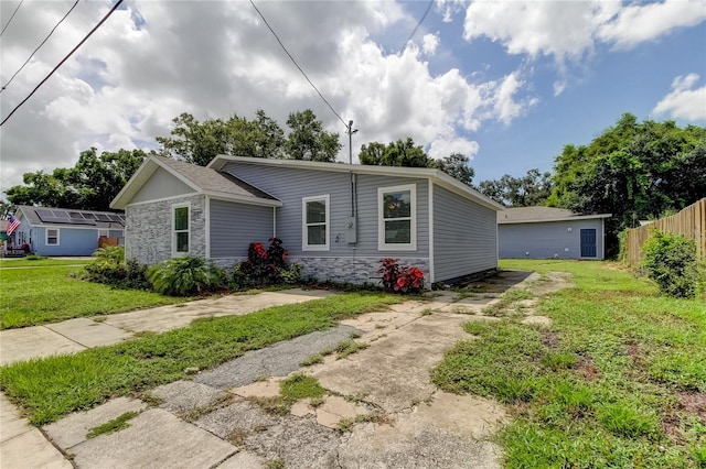 view of front of home with a front yard