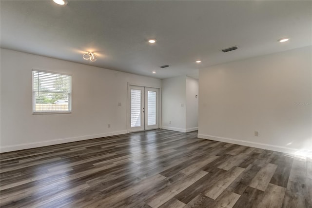 unfurnished room with french doors and dark hardwood / wood-style floors