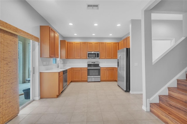 kitchen with stainless steel appliances and sink