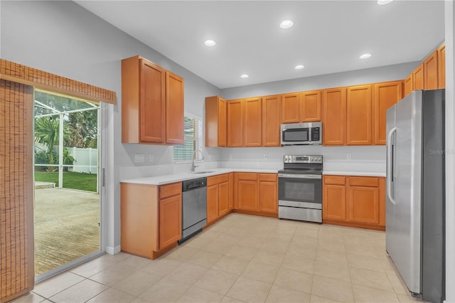 kitchen with sink and appliances with stainless steel finishes