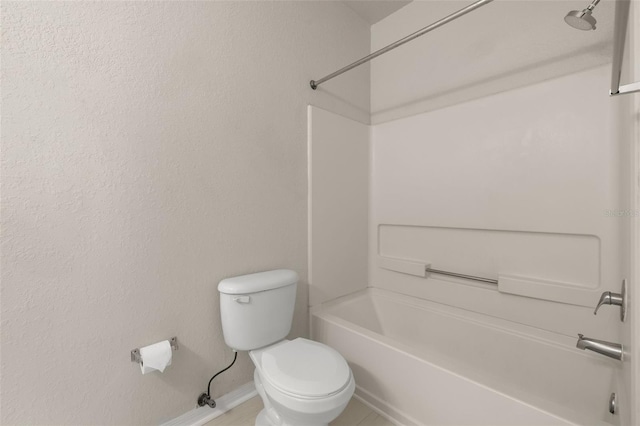 bathroom featuring toilet and shower / bathing tub combination