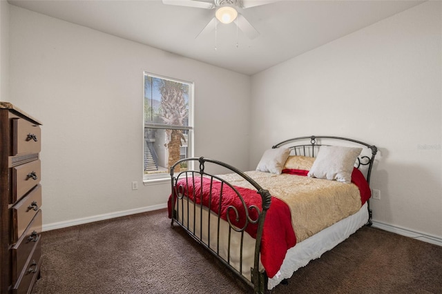 bedroom featuring dark colored carpet and ceiling fan