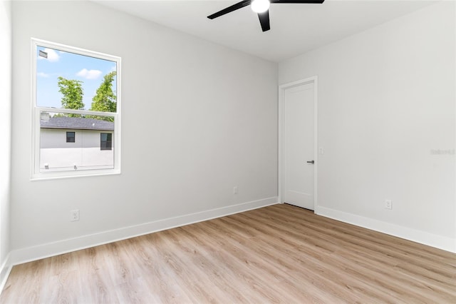 unfurnished room featuring ceiling fan and light hardwood / wood-style floors