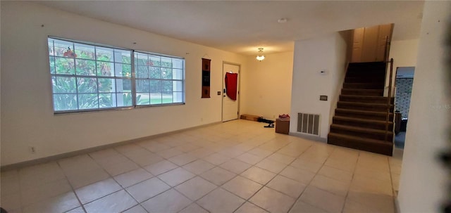 view of tiled spare room