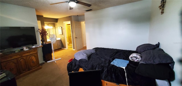 carpeted living room with a textured ceiling and ceiling fan