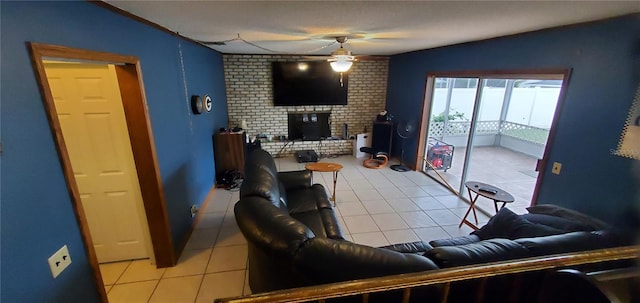 living room featuring lofted ceiling, ceiling fan, light tile patterned floors, and a brick fireplace