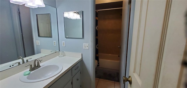 full bathroom featuring shower / bathing tub combination, vanity, toilet, and tile patterned floors