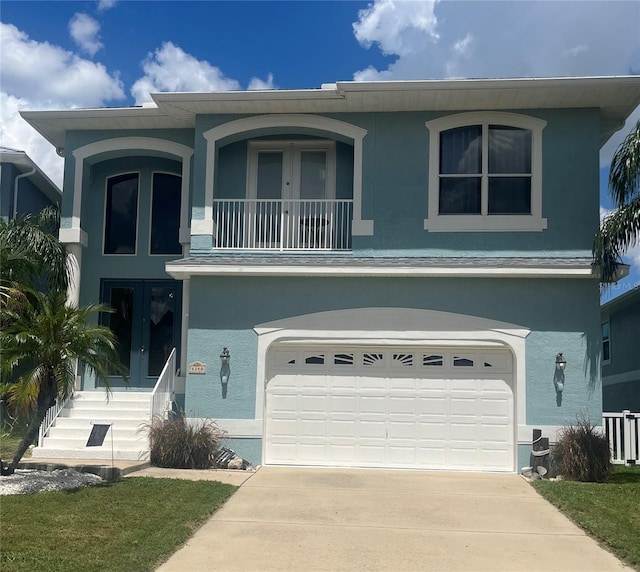 view of front of home with a garage