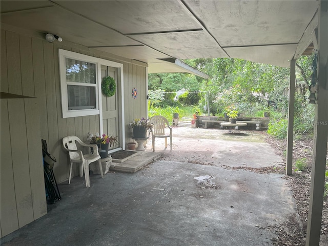 view of patio / terrace featuring an outdoor fire pit