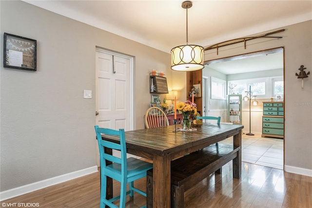 dining area with light hardwood / wood-style flooring