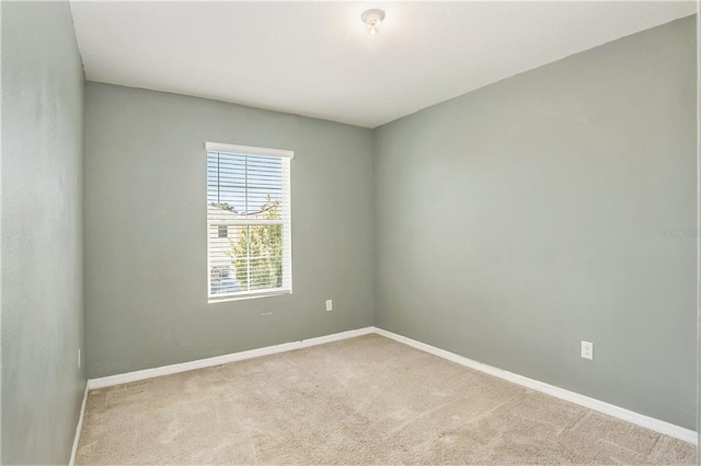 empty room with carpet flooring