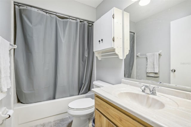 bathroom with shower / tub combo with curtain, toilet, and vanity