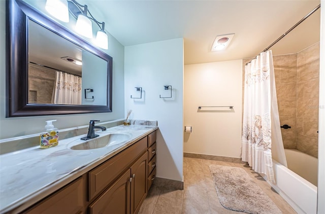 7037 Sunset Dr S Unit 602, South Pasadena, FL 33707 - bathroom with shower / bath combination with curtain, tile patterned floors, vanity, and baseboards